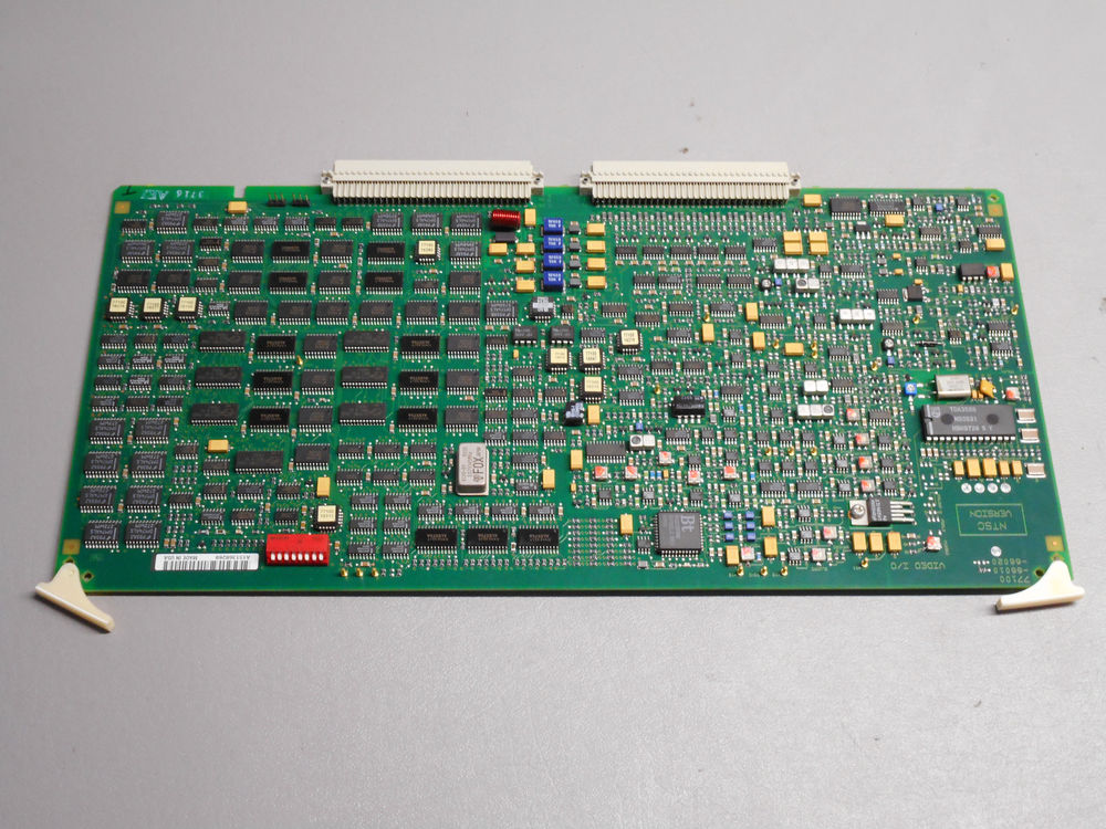 a close up of a circuit board on a table