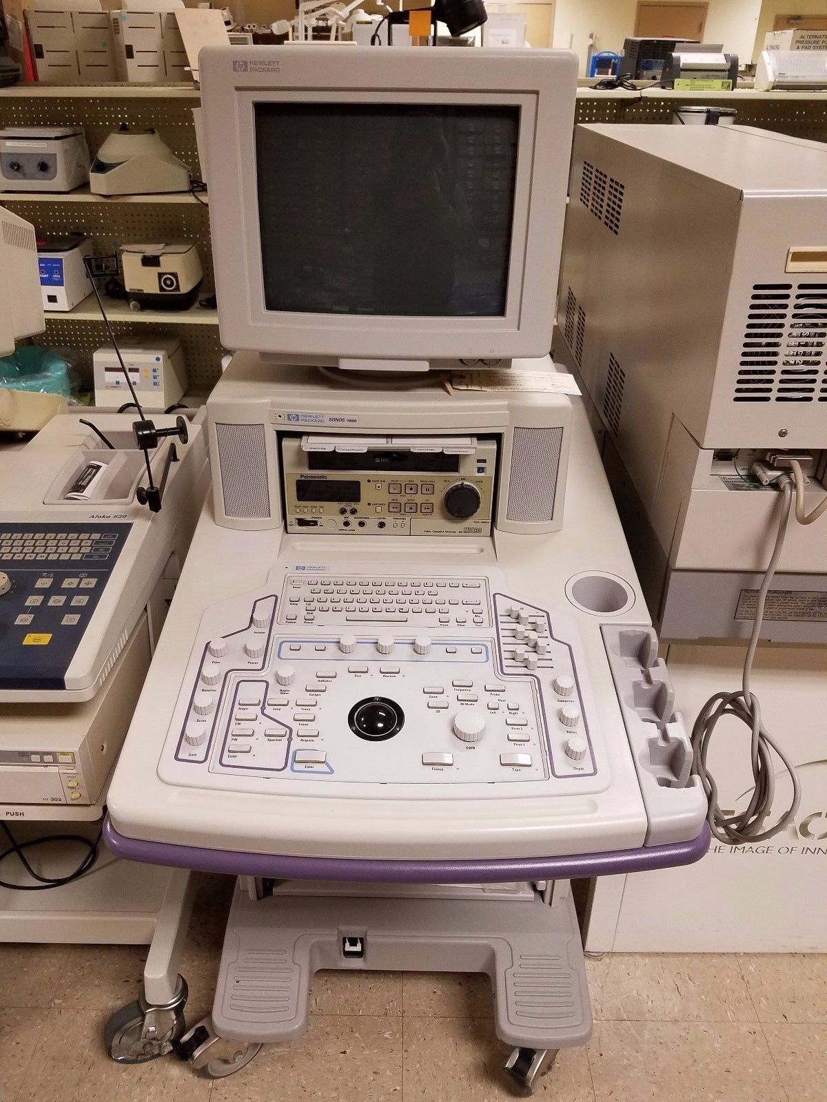 a laptop computer sitting on top of a table