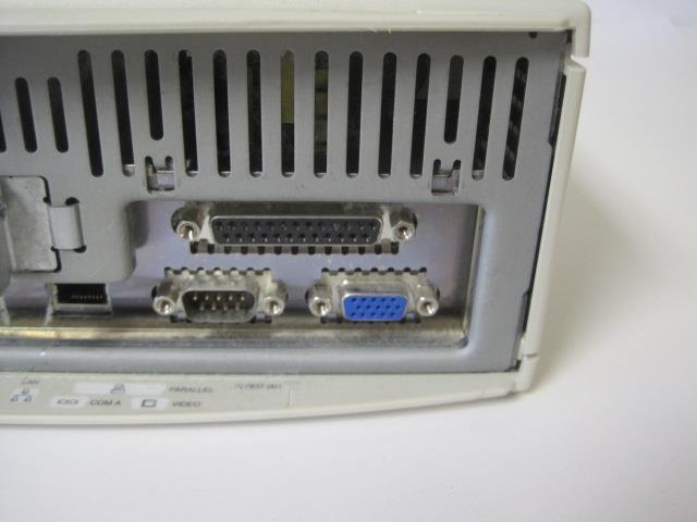 a close up of a router with wires attached to it