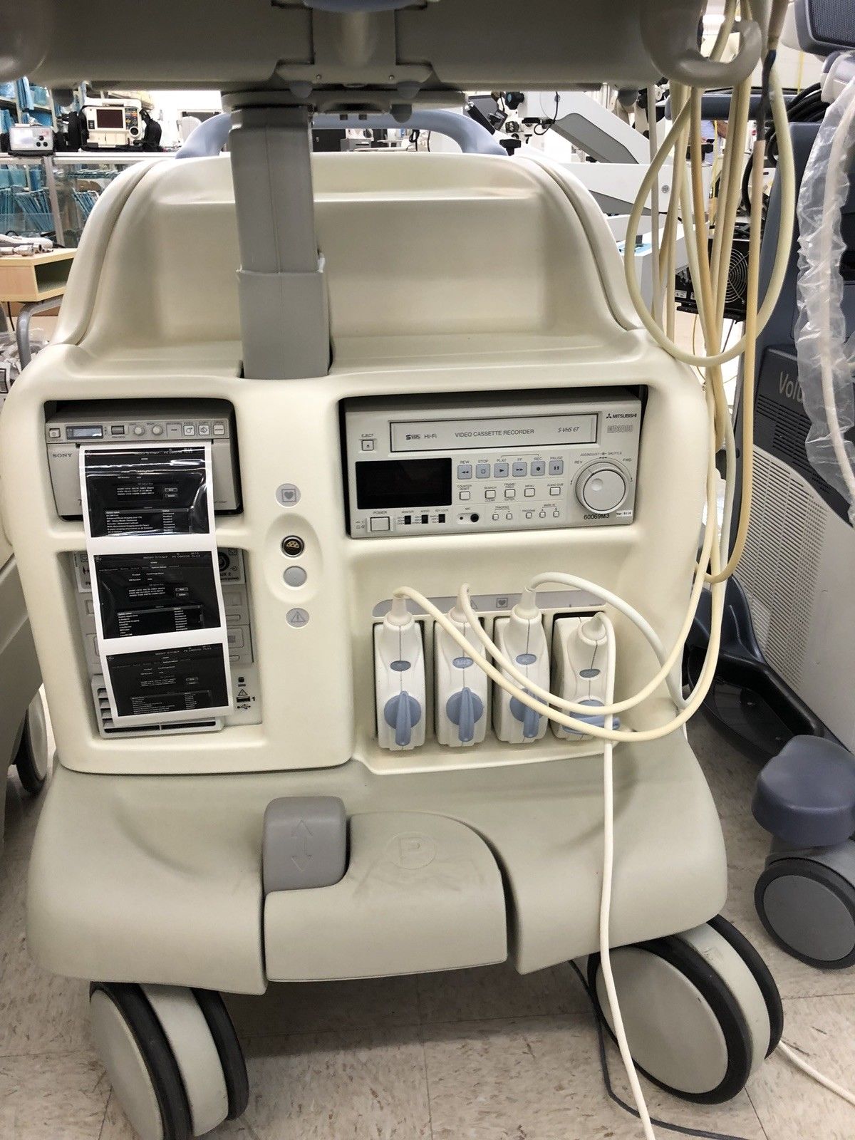 a hospital room with medical equipment in it