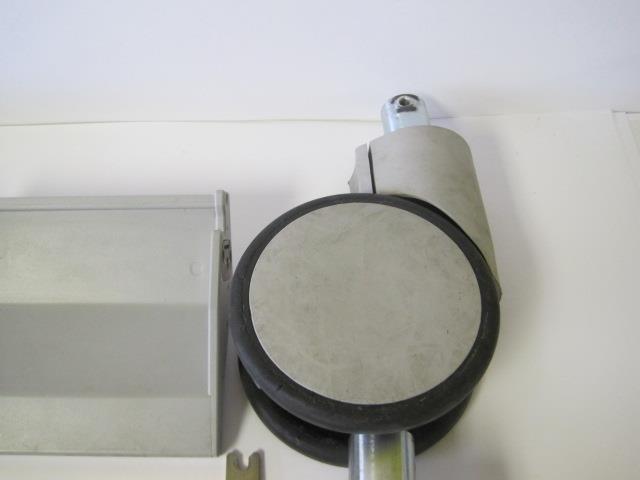 CASTER FRONT BACK LOCK