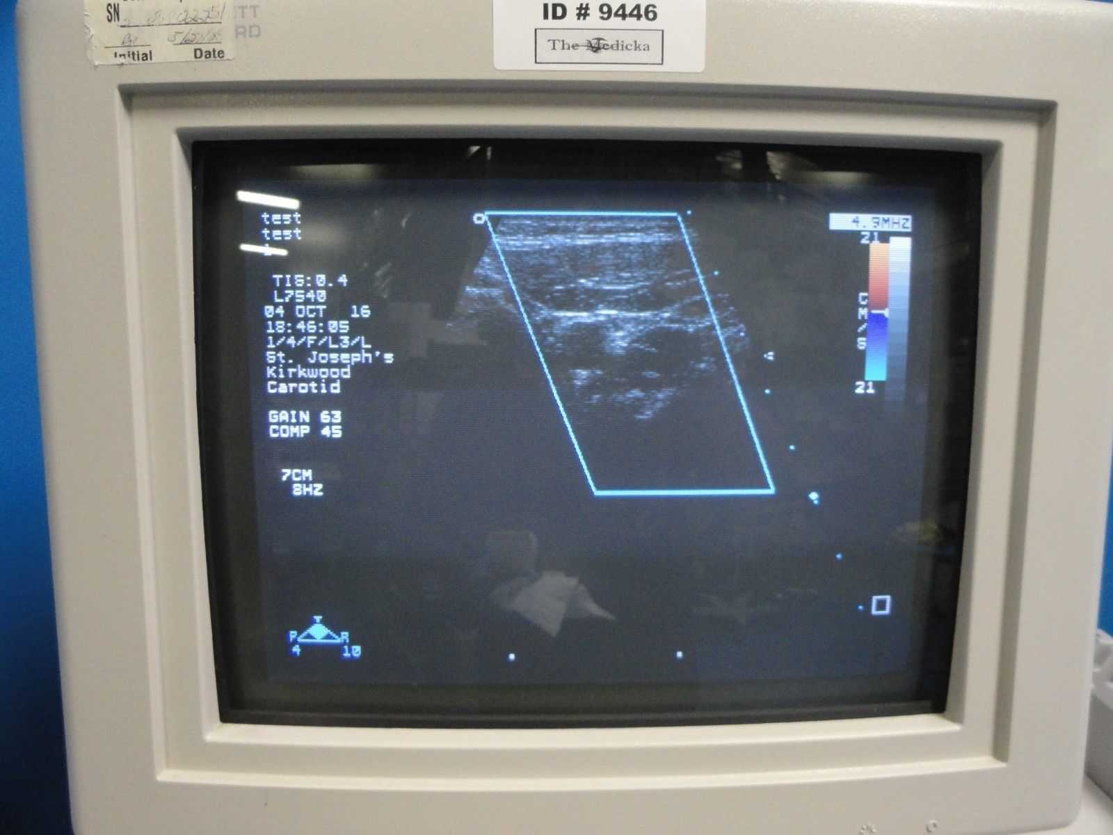 an old computer monitor with a blue background