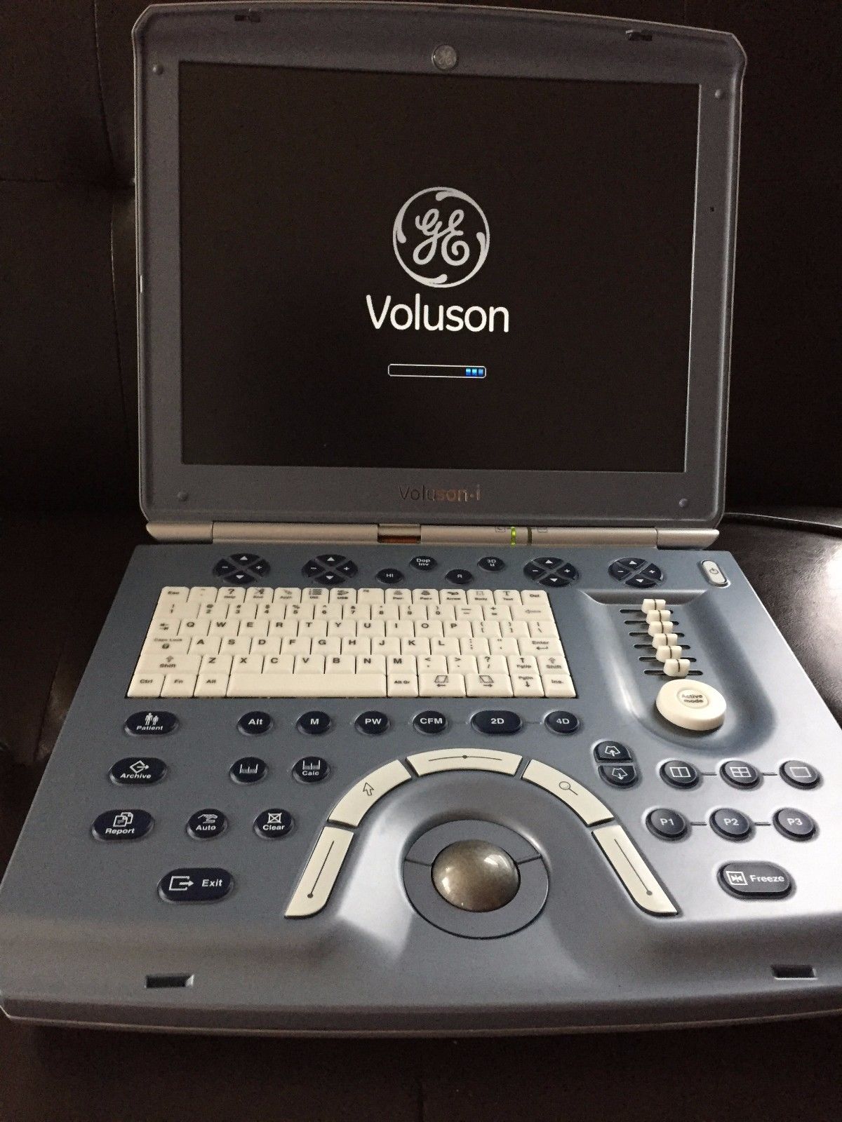 a ultrasound computer sitting on top of a desk