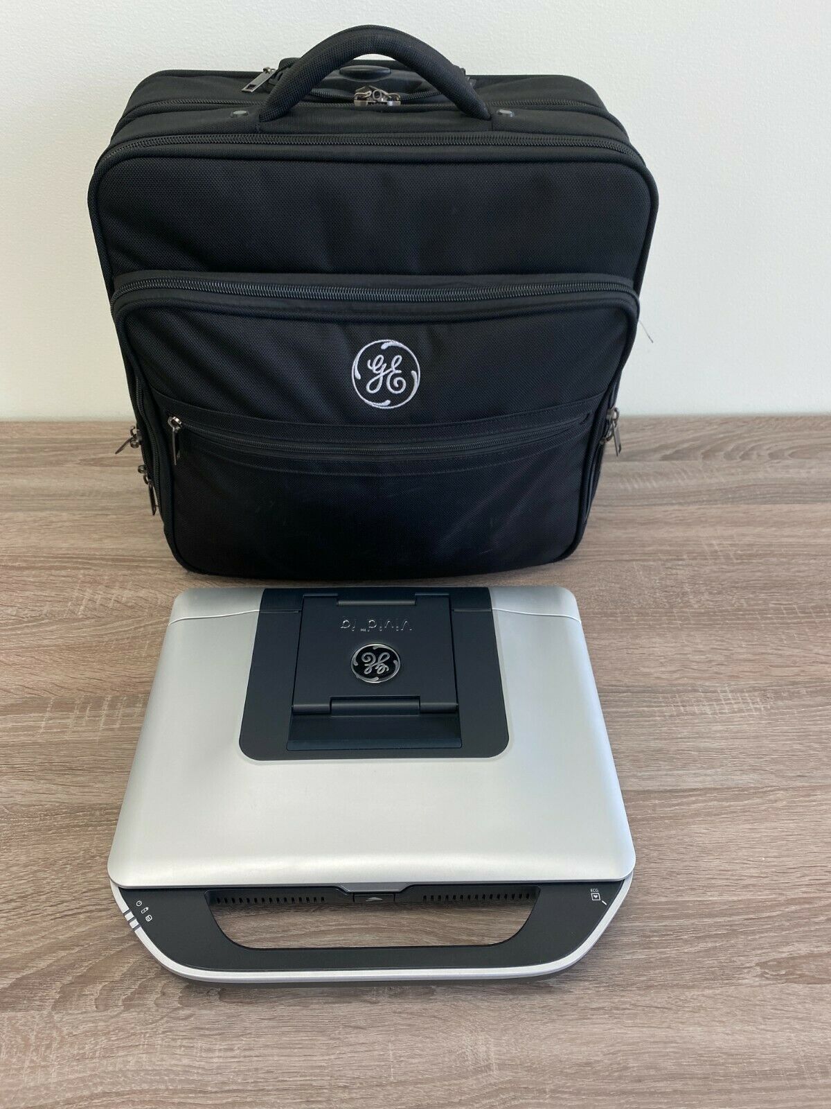 GE Vivid iQ Premium Portable Ultrasound System w/ M5Sc-Rs & 9L-Rs Probes DIAGNOSTIC ULTRASOUND MACHINES FOR SALE