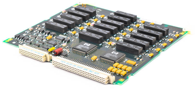 a close up of a computer board with many electronic components