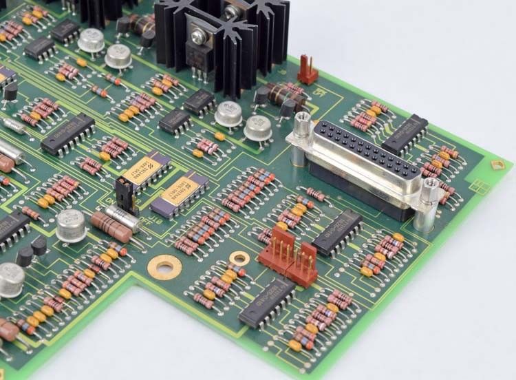 a close up of a circuit board with many electronic components