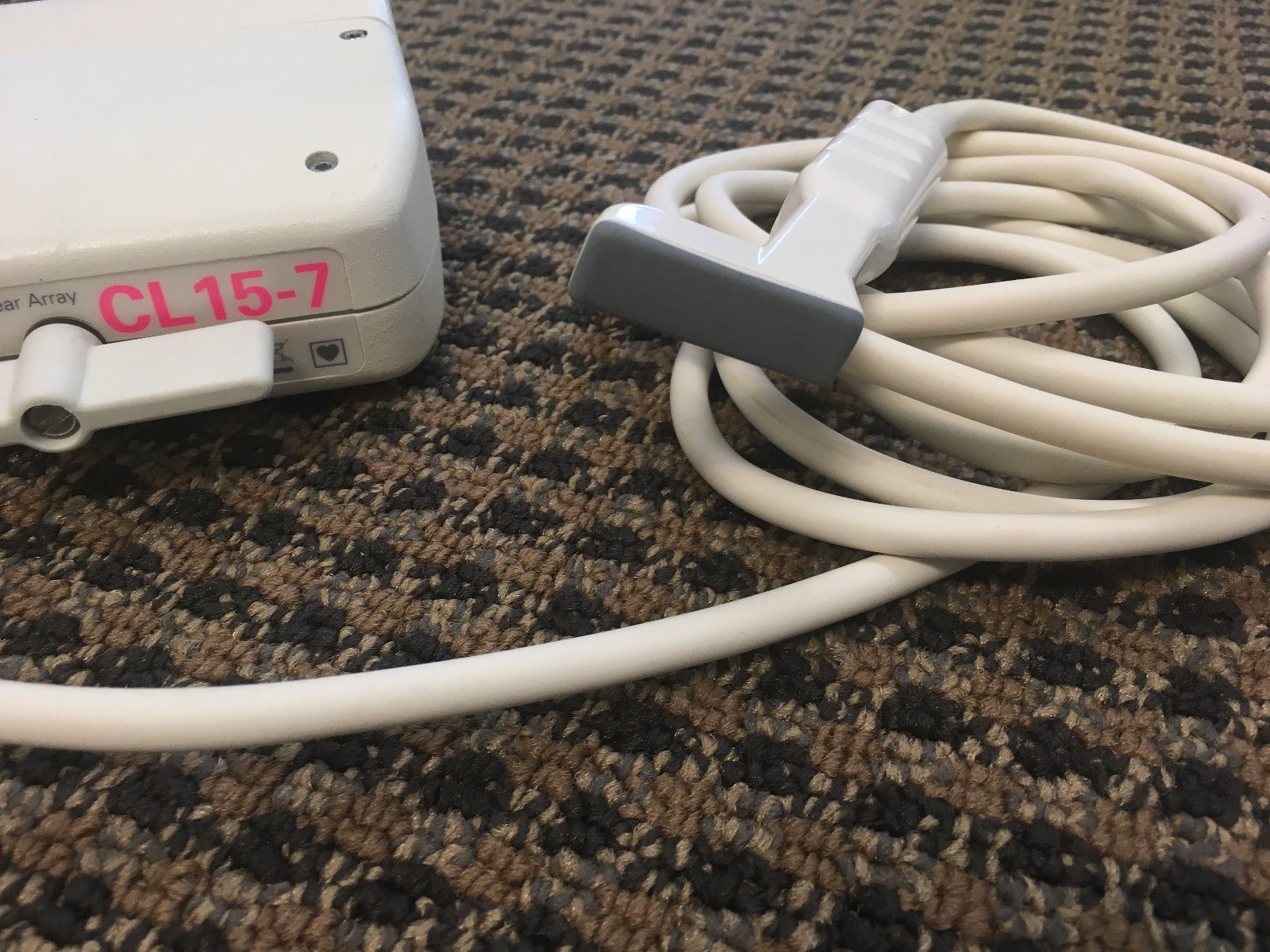a close up of a probe cord connected 