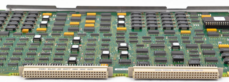 a close up of a computer board with many different types of electronic components