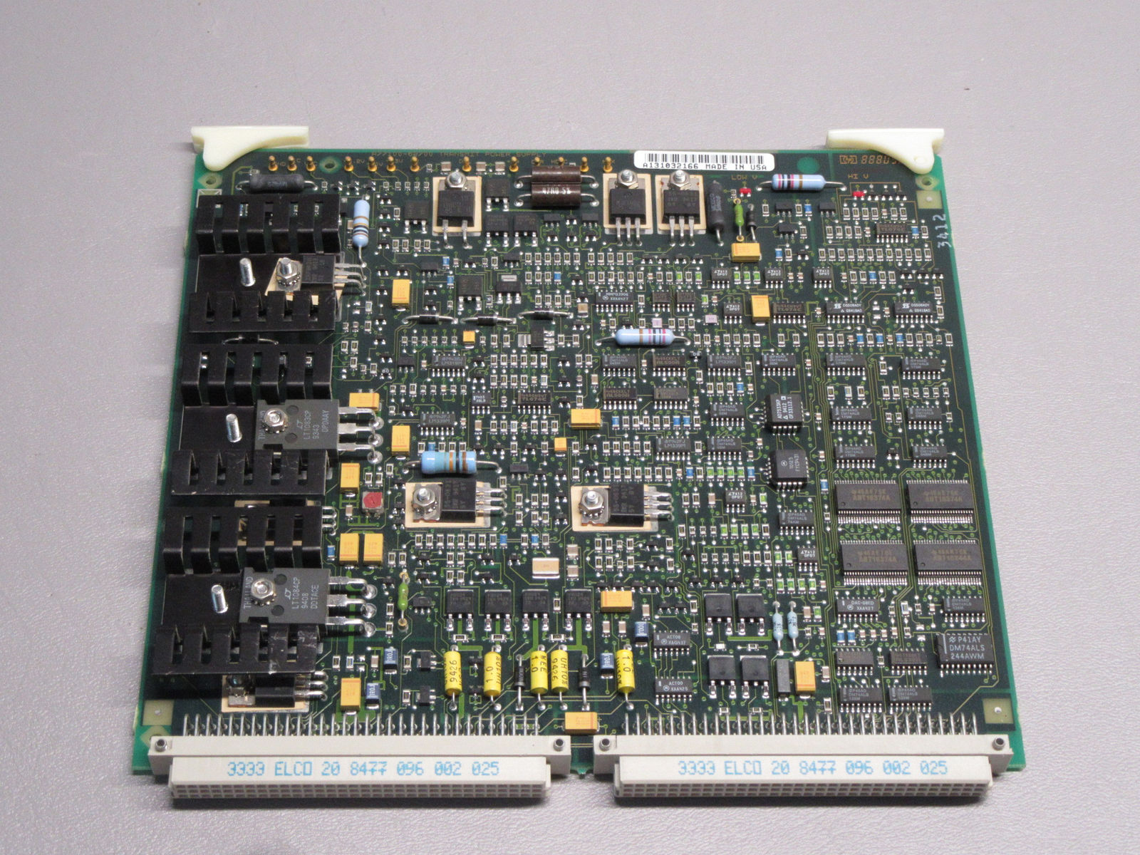 a close up of a computer board with many components