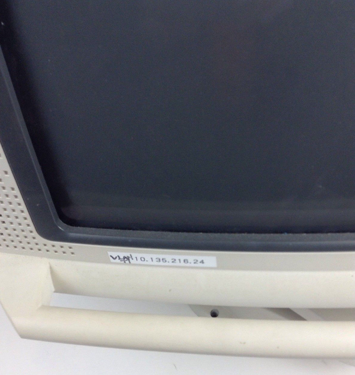 a close up of a computer monitor with a black screen