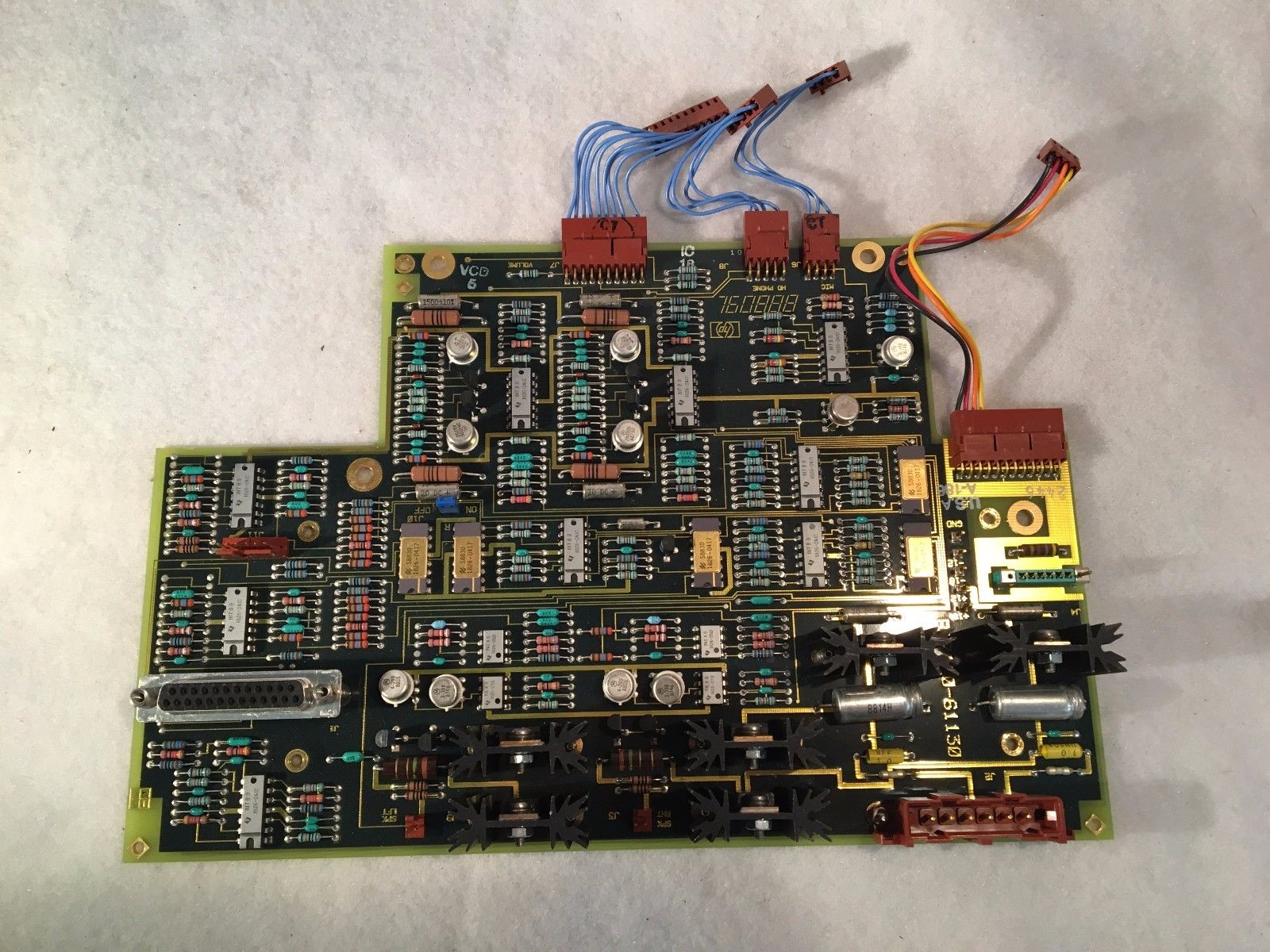 a close up of a electronic board with wires