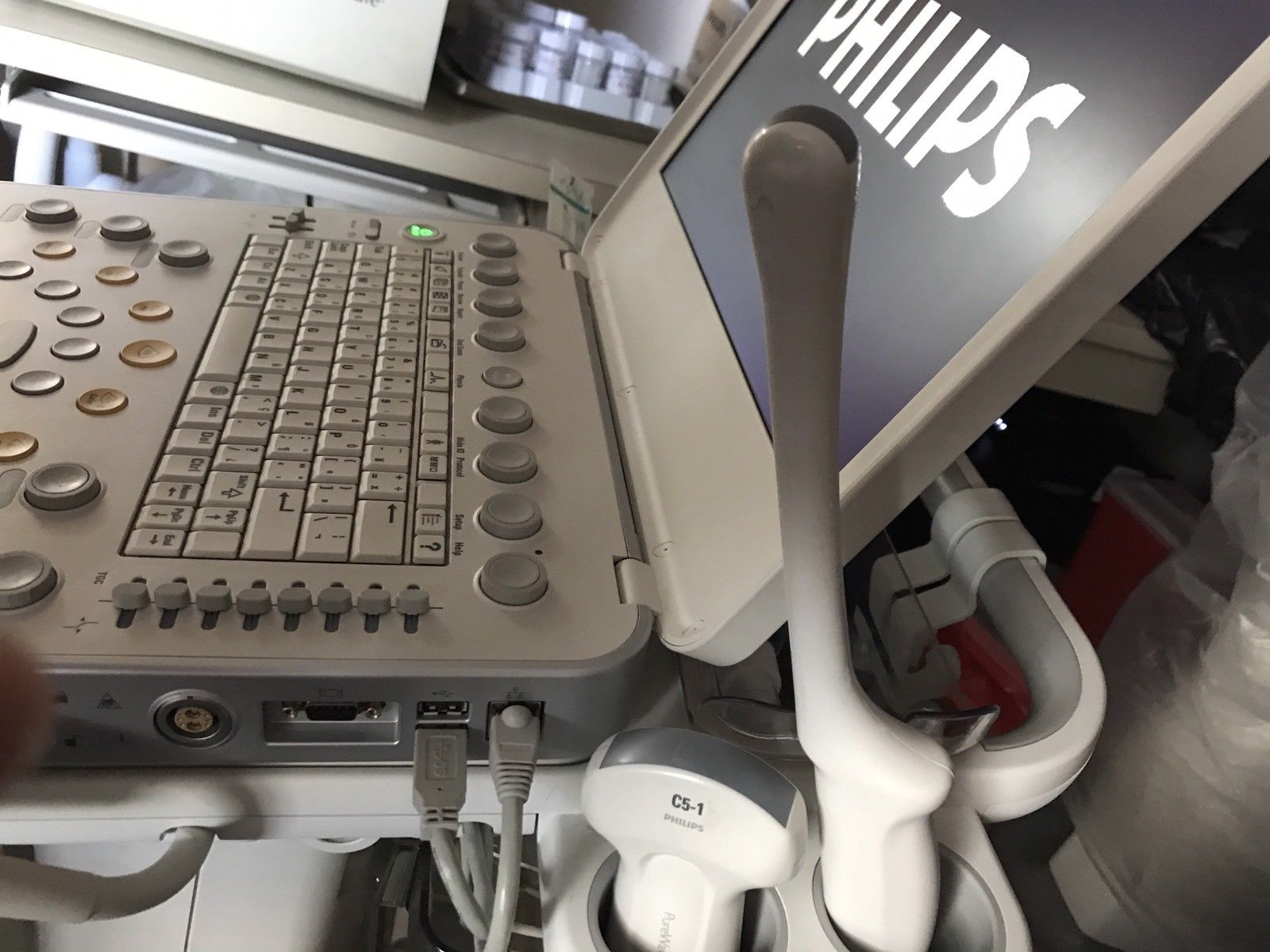 a laptop computer sitting on top of a table