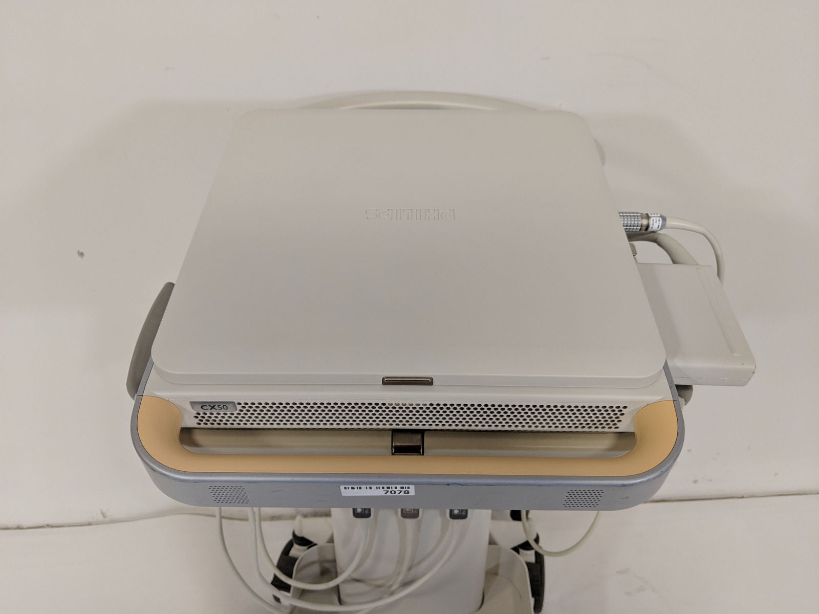 a laptop computer sitting on top of a table