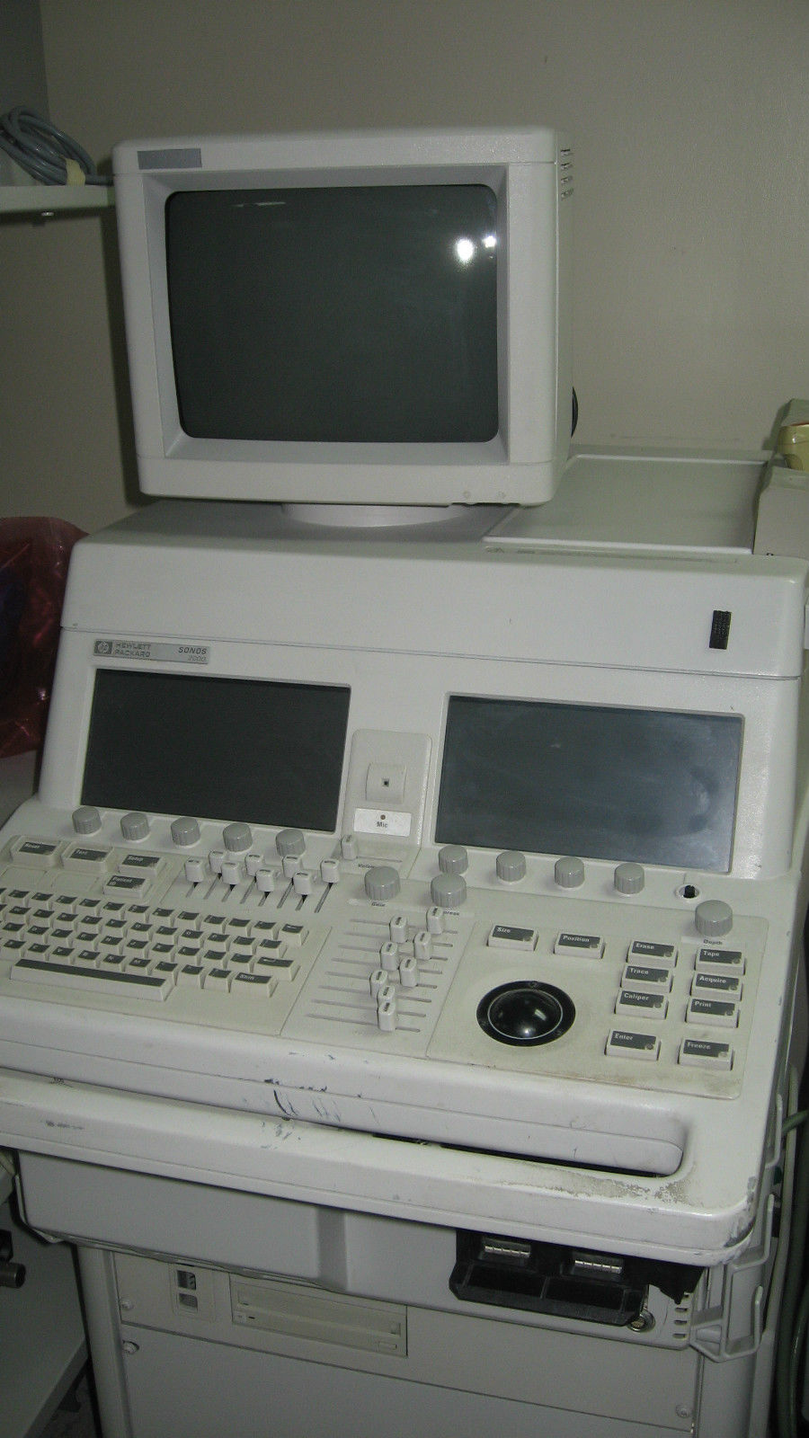 a white computer sitting on top of a desk