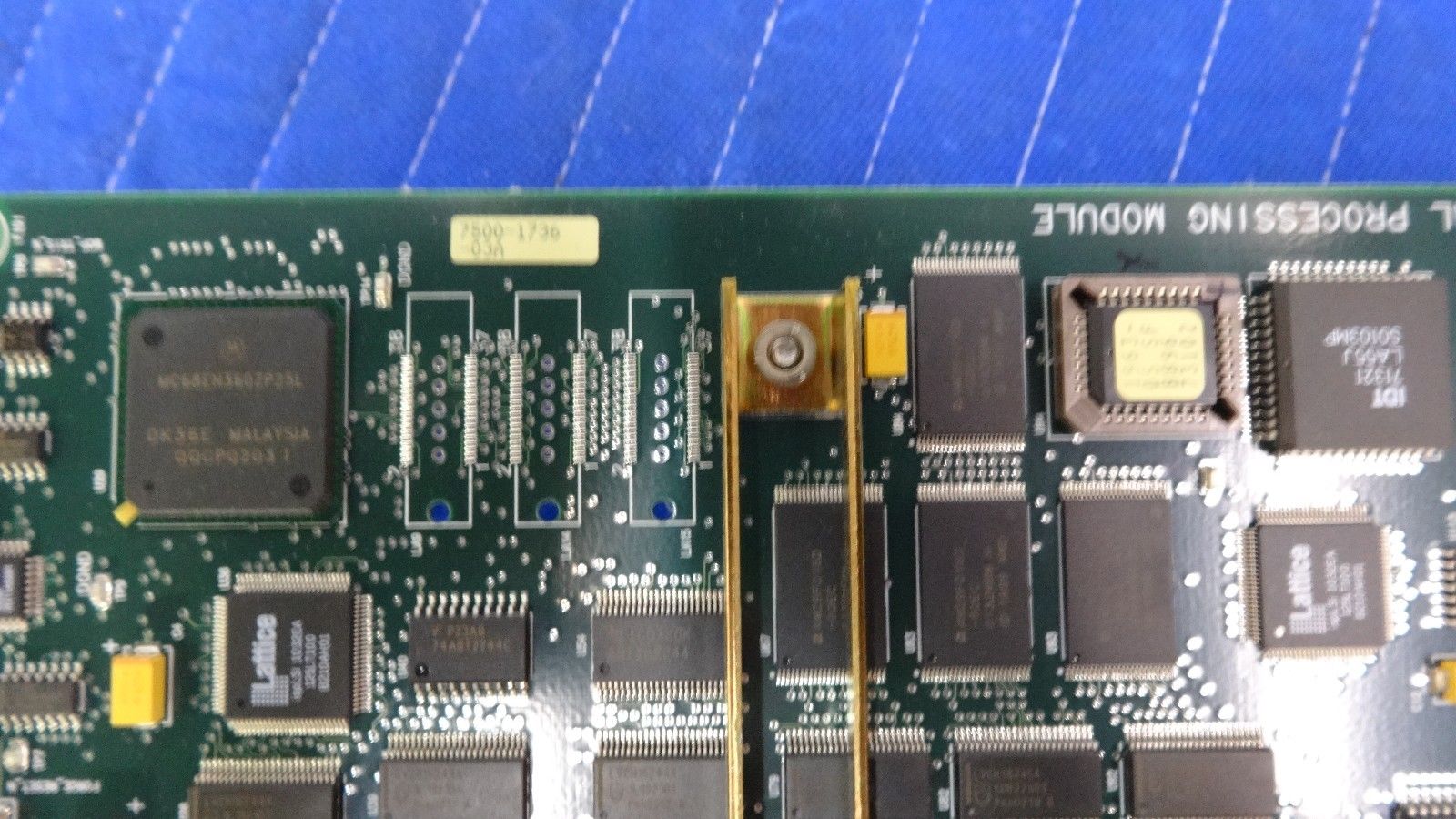 a close up of a motherboard with many chips