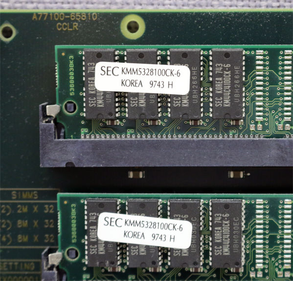 a close up of two memory cards on a computer