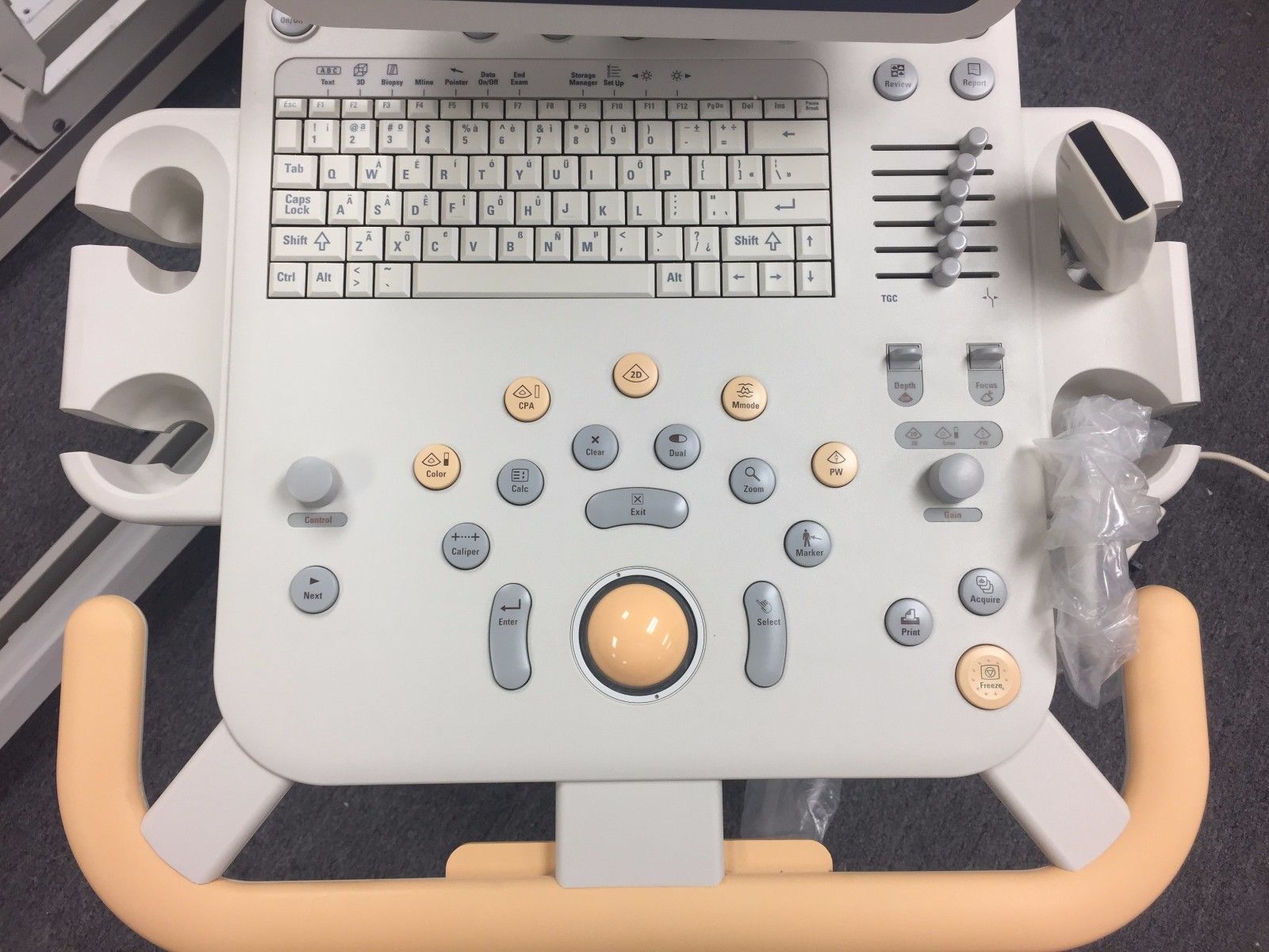 a computer with a keyboard and a mouse on it