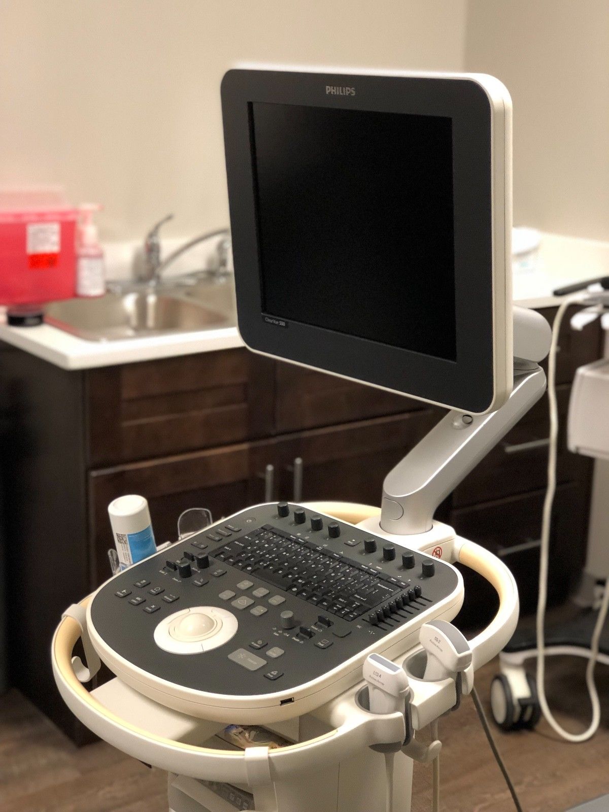 a computer monitor sitting on top of a table