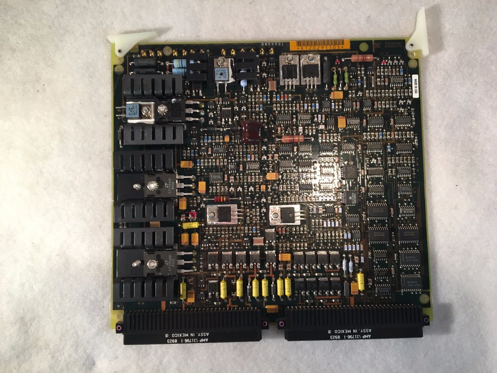 a close up of a computer board with many components